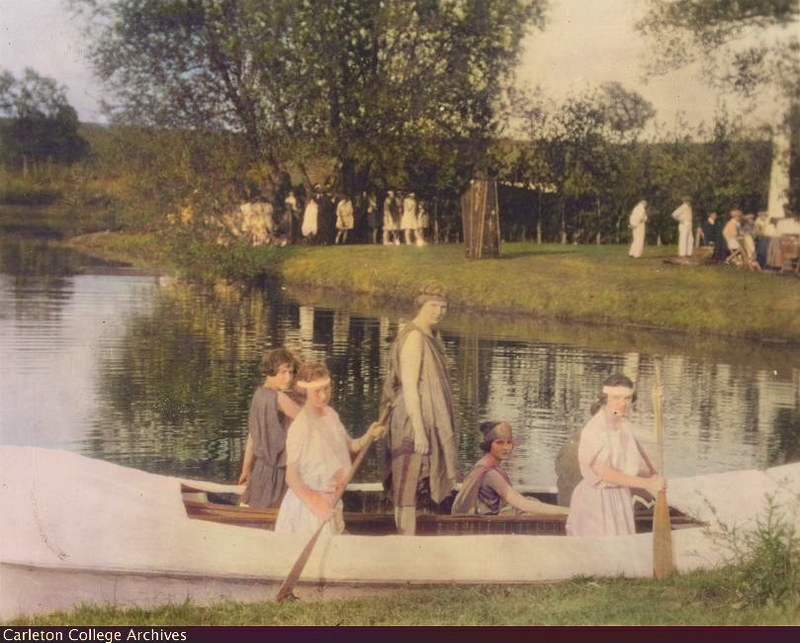 COLORIZED: May Fete 1921 - behind the scene - some women in a canoe.<br /><br />
