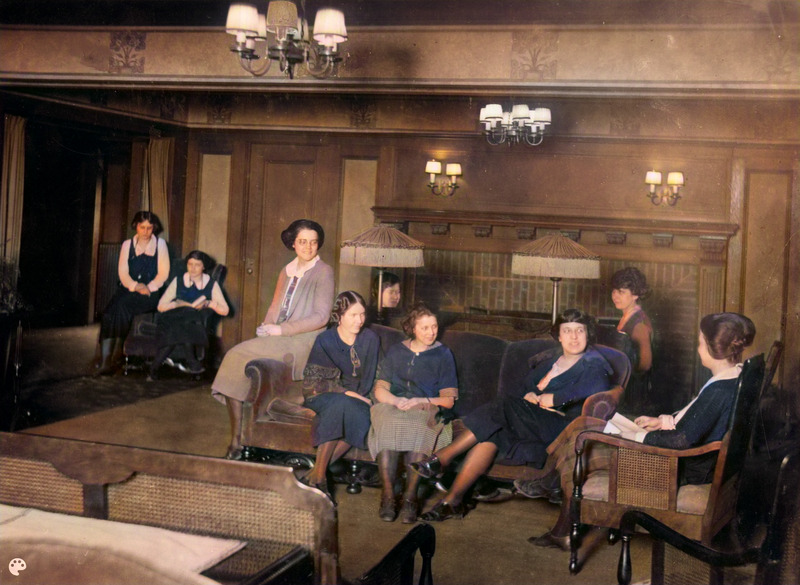 COLORIZED: New Women's Dormitory /Nourse Hall interior: parlor, with nine women