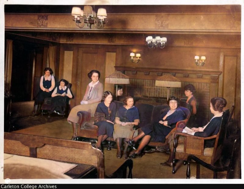 COLORIZED: New Women's Dormitory /Nourse Hall interior: parlor, with nine women