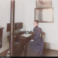 COLORIZED: Goodsell Observatory interior: Charlotte R. Willard in charge of the time service