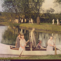 COLORIZED: May Fete 1921 - behind the scene - some women in a canoe.<br /><br />
