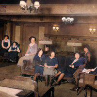 COLORIZED: New Women's Dormitory /Nourse Hall interior: parlor, with nine women