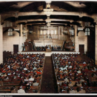 COLORIZED: 	<br /><br />
Interior of the chapel during a meeting of the men students
